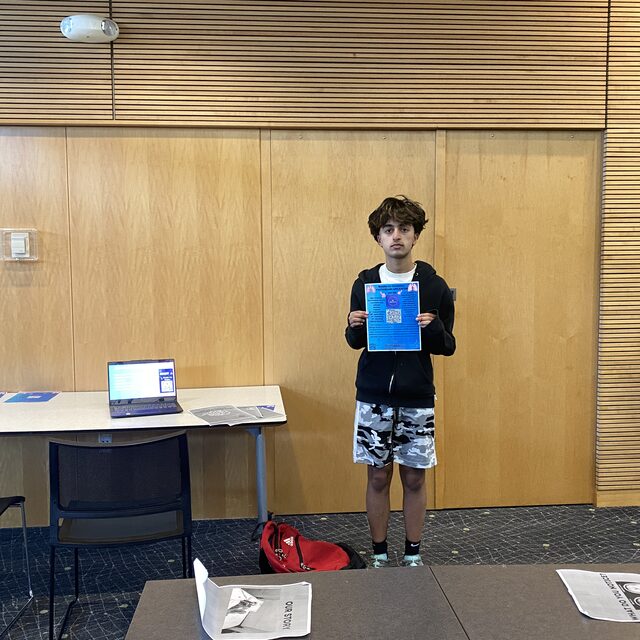 Breathe-On student volunteer leading a library presentation